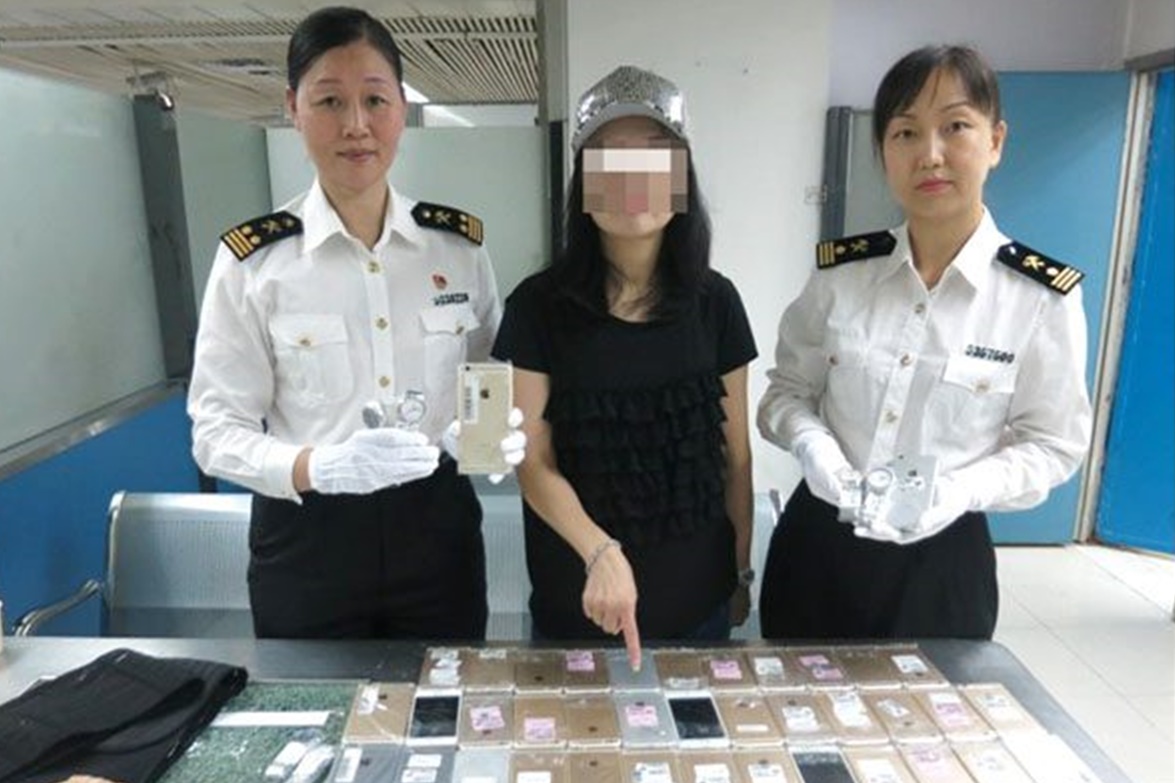 Imagem de Mulher é presa em alfândega na China com 102 iPhones amarrados ao corpo no tecmundo